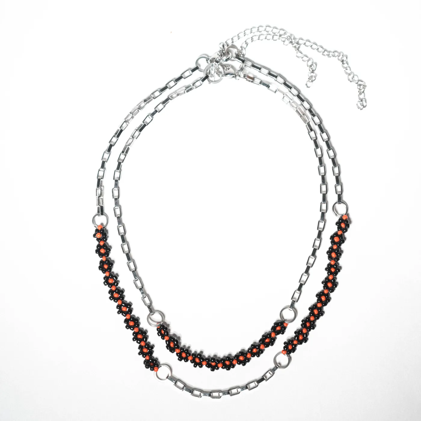 Layered silver-tone chain necklace with black and red beadwork